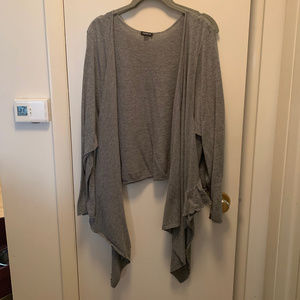 Torrid open cardigan with ruffle trim.